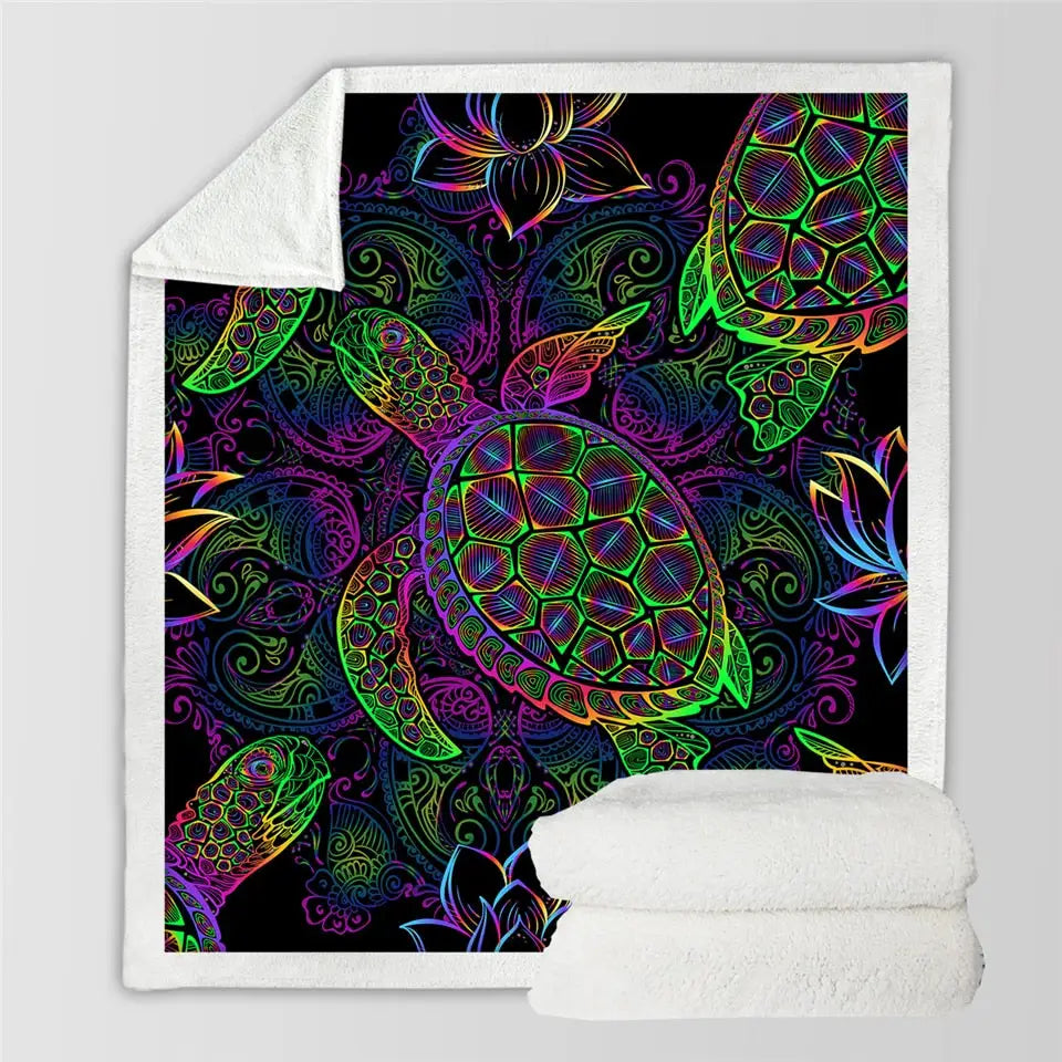 Colorful neon sea turtle design on a soft fleece blanket with mandala patterns