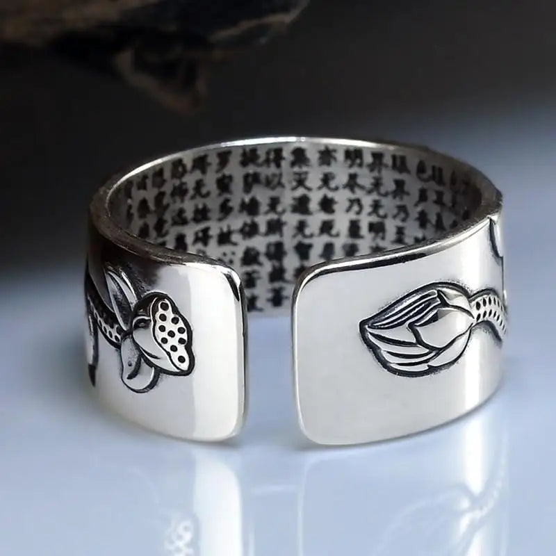 Silver cuff bracelet with engraved Chinese characters and decorative designs in sterling silver