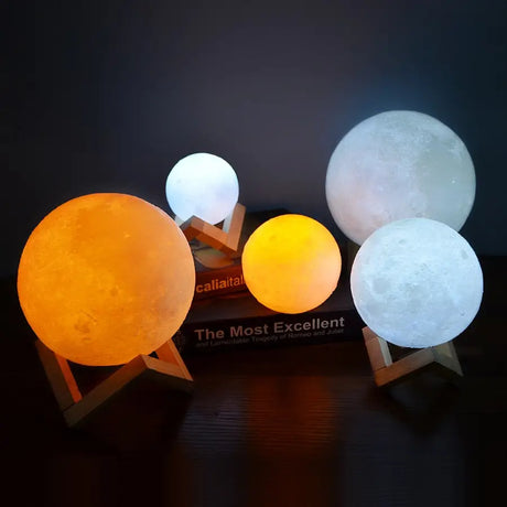 Colorful GoodNight Moon Lamps on wooden stands, perfect as night lights