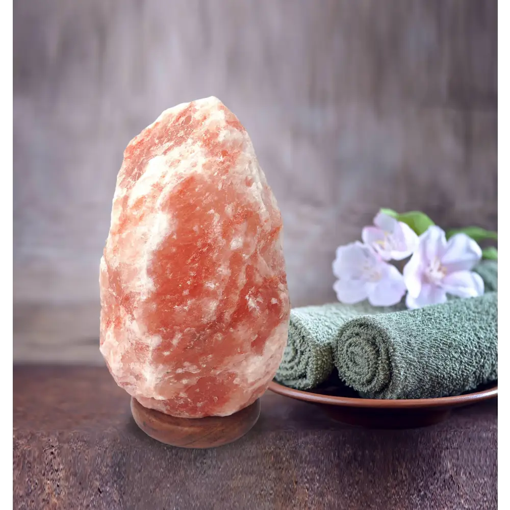 Pink Himalayan salt lamp glowing warmly, enhancing ambiance with natural salt benefits