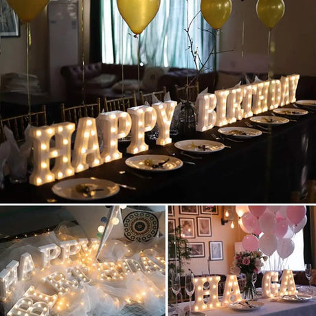 Illuminated marquee letters spelling Happy Birthday with glowing white bulbs