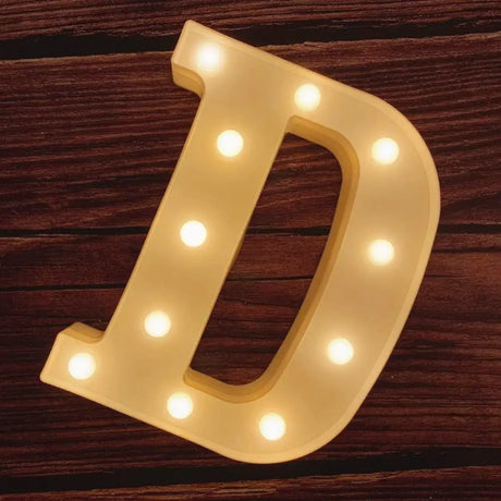 Illuminated marquee letter D with glowing light bulbs for Happy Birthday Sign