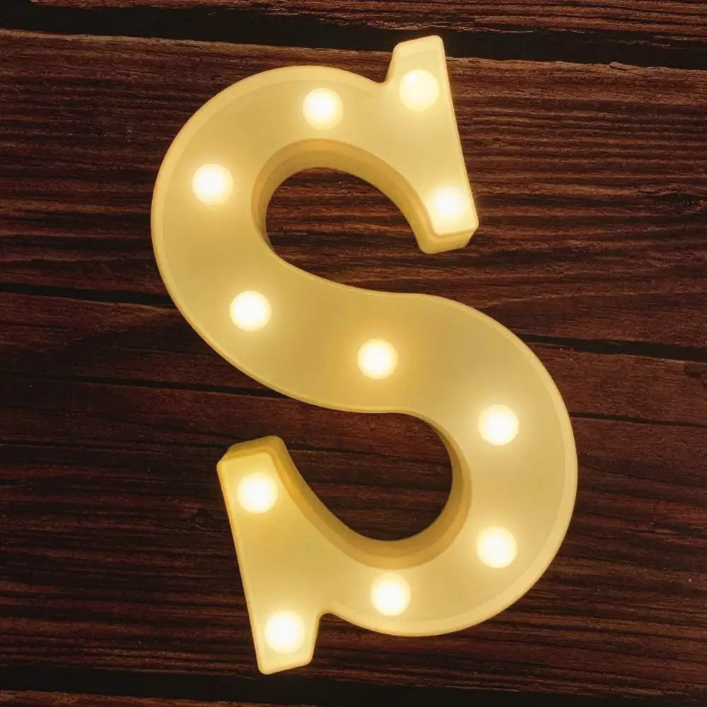 Illuminated letter S as part of illuminated marquee letters for Happy Birthday sign