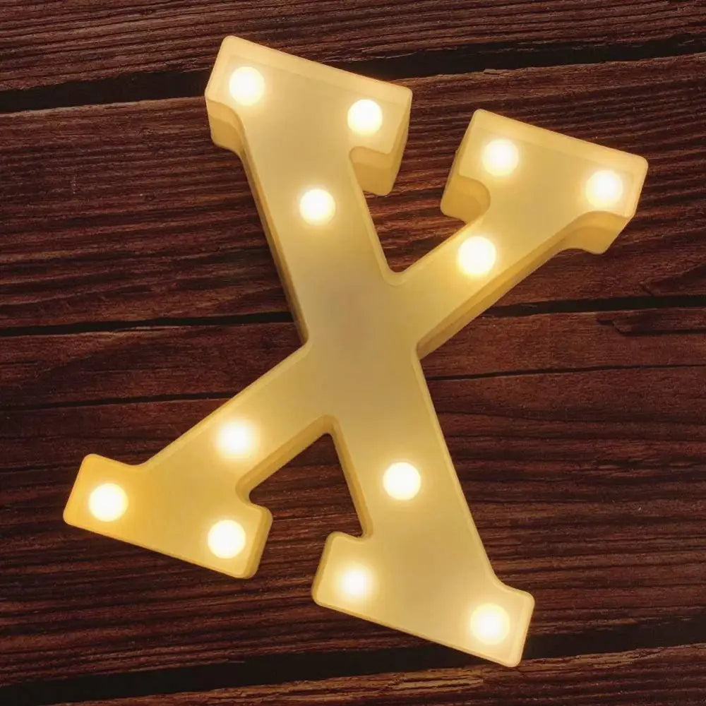 Illuminated letter X with LED lights in an illuminated marquee birthday sign