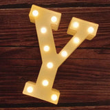 Illuminated marquee letter Y with glowing light bulbs for Happy Birthday Sign