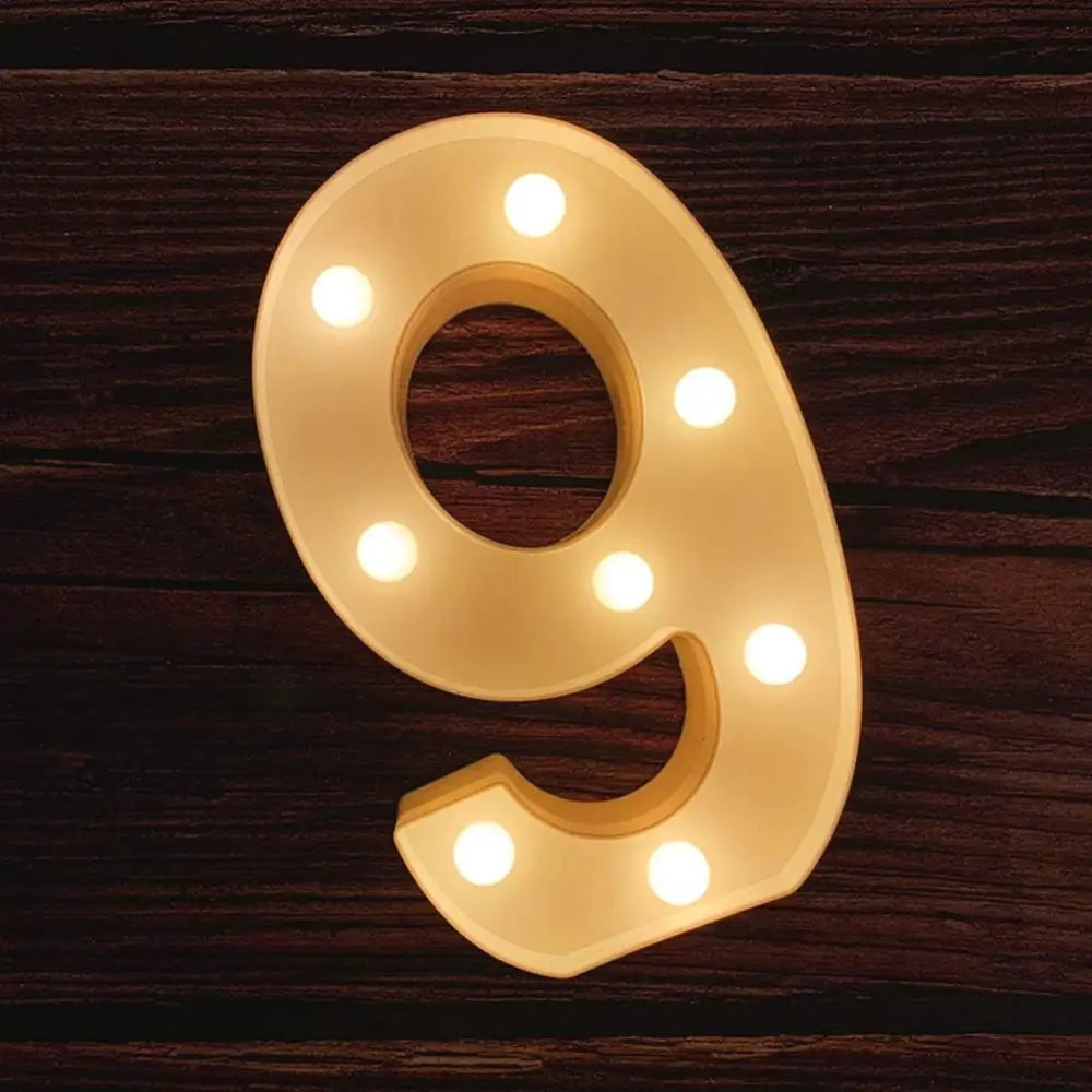 Illuminated number 9 with glowing bulbs in Illuminated Marquee Letters birthday sign