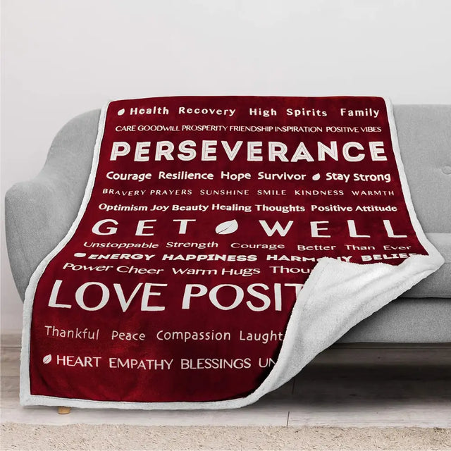 Red and white healing fleece blanket with inspirational words for comfort and support