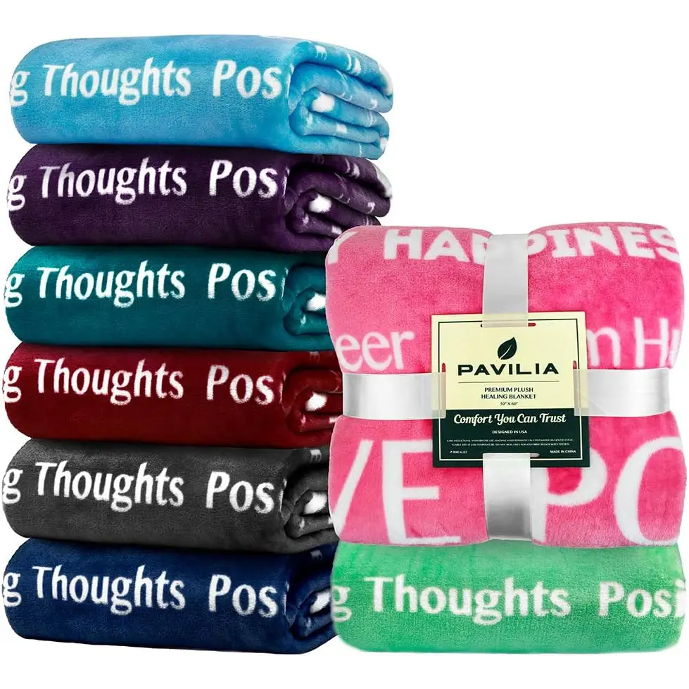 Stack of colorful healing fleece blankets, perfect as a gift hug or sympathy blanket