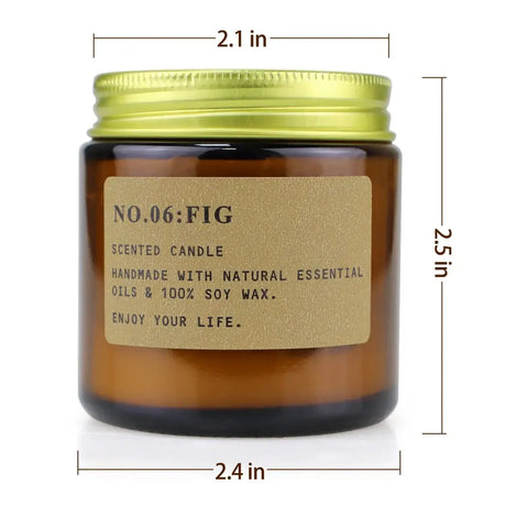 Amber glass jar with gold lid holding fig-scented soy wax from scented candles gift set