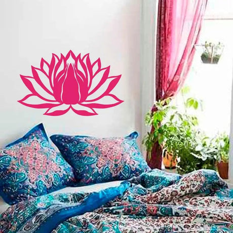 Pink Lotus Flower Vinyl Sticker enhancing patterned bedding in a stylish bedroom