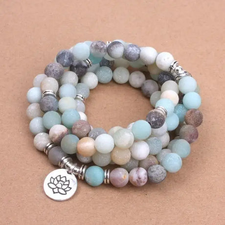 Multi-strand beaded bracelet with Amazonite, Jasper stones, and a lotus charm for mala beads