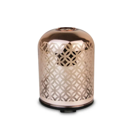 Rose gold metallic glass essential oil diffuser with geometric lattice pattern