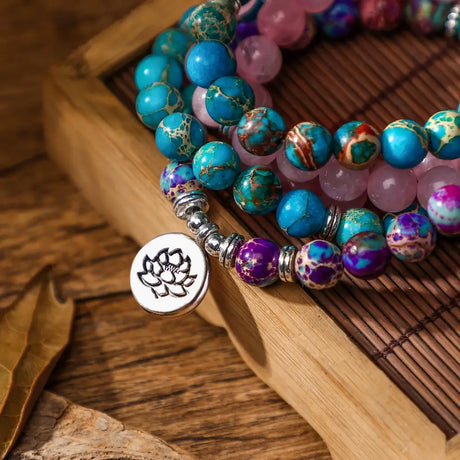 Colorful mala beads bracelet with Rose Quartz, turquoise, purple stones, and lotus charm