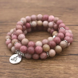 Pink and beige mala beads bracelet with silver Lotus OM Buddha charm pendant