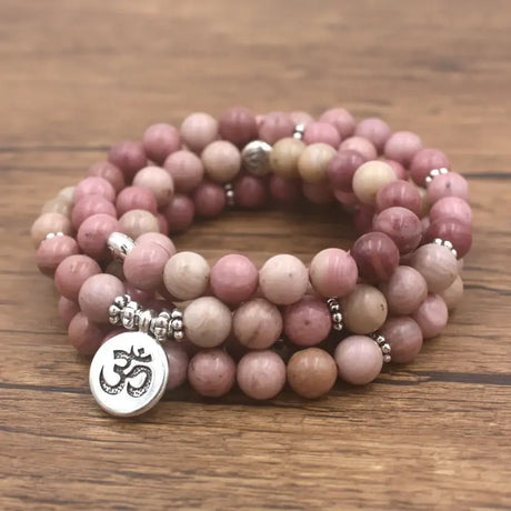 Pink Rhodonite beaded wrap bracelet with silver Om charm, a stylish Mala Beads bracelet