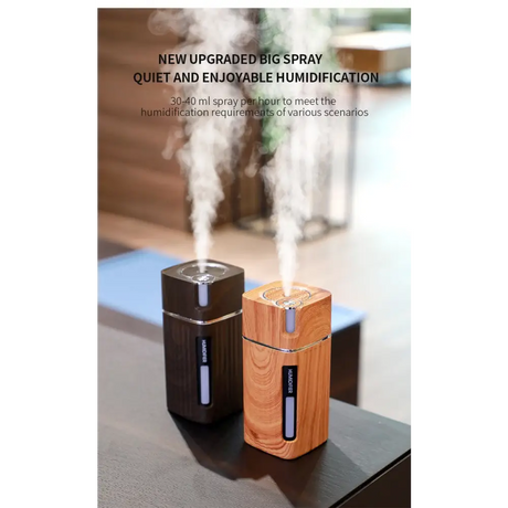 Two wood-grain essential oil diffusers emitting steam with LED night light features