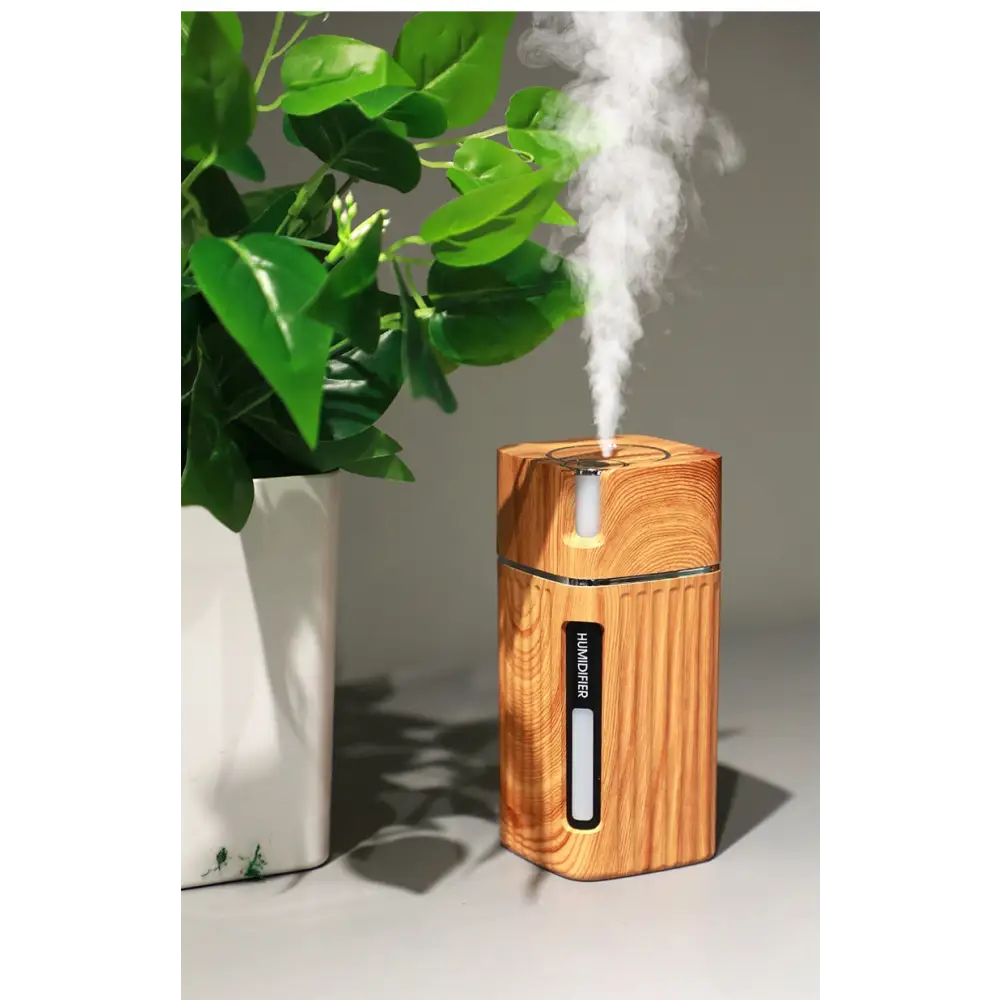 Wooden essential oil diffuser with LED night light emitting soothing white mist