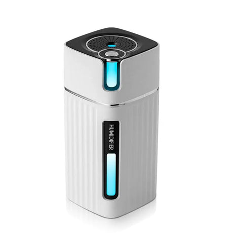 White portable essential oil diffuser with blue LED night light accents