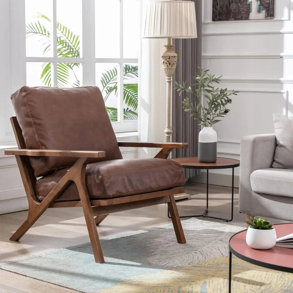 Mid-century modern accent chair with removable cushions in modern brown leather and wooden frame