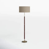 Modern floor lamp with wooden pole and brass base beside Modern Grey Sectional Sofa