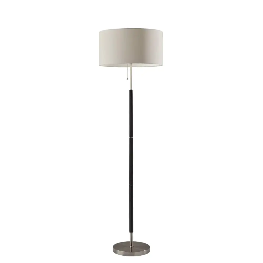 Modern floor lamp with black pole and beige shade beside Modern Grey Sectional Sofa