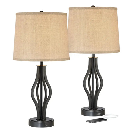 Two dark iron modern industrial table lamps with beige drum shades and USB charging