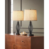 Two dark iron industrial table lamps with beige shades and USB charging features