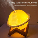 Yellow moon lamp humidifier on wooden stand with vapor rising for soothing ambiance