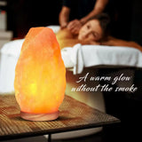 Glowing pink Himalayan Crystal Salt Lamp on wooden surface for natural ambiance