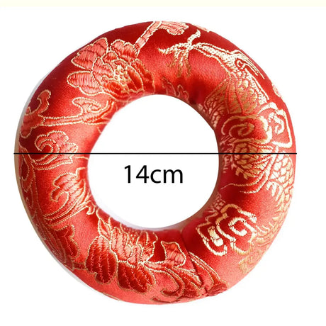 Red silk brocade ring cushion with gold floral embroidery for Himalayan hand-hammered singing bowl