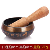 Tibetan singing bowl with striker, hand-hammered copper and carved symbols