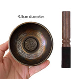 Tibetan singing bowl with wooden striker in Himalayan hand-hammered design