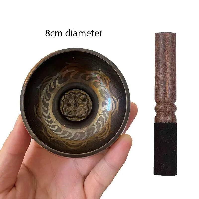 Tibetan singing bowl with wooden striker from Nepal, Himalayan hand-hammered design