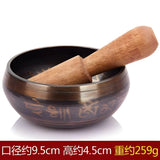 Tibetan singing bowl with wooden mallet, Himalayan hand-hammered copper design