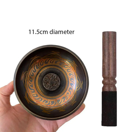 Tibetan singing bowl with ornate patterns inside, Nepal Himalayan hand-hammered design