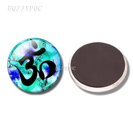 Circular magnet with Om symbol on turquoise and blue background, ideal boho refrigerator decor