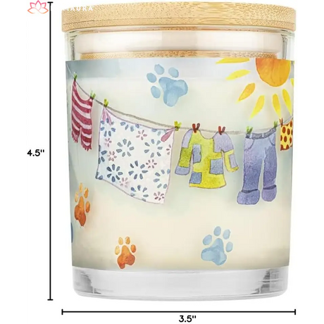 Glass candle holder with whimsical laundry line and paw prints for eco-friendly soy candles