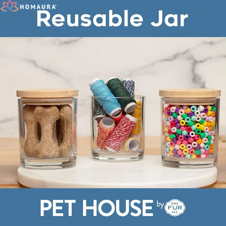 Three glass jars with wooden lids holding dog treats, thread, and beads near Eco-Friendly Soy Candles