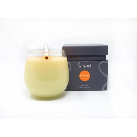 Lit Douglas Fir Lavender Candle in frosted glass next to black retail box