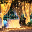 Sheer curtains with curtain string lights create a romantic backdrop for dreamy settings