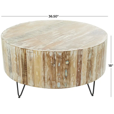 Rustic round coffee table featuring a reclaimed wood top and hairpin metal legs