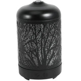 Black metal essential oil diffuser with tree branch silhouette for ultrasonic aromatherapy