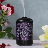 Black Sacred Tree Essential Oil Diffuser illuminated in purple for ultrasonic aromatherapy