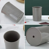 Gray cylindrical metal container for storing Silicone Kitchen Utensils and utensils set