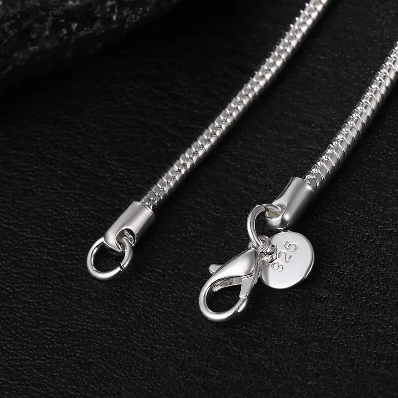 Sterling Silver Snake Chain Necklace Set featuring lobster clasp closures at both ends