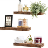 Set of three rustic floating shelves displaying decorative items for stylish wall decor