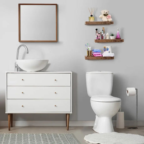 White bathroom vanity with vessel sink for stylish wall decor and floating shelves