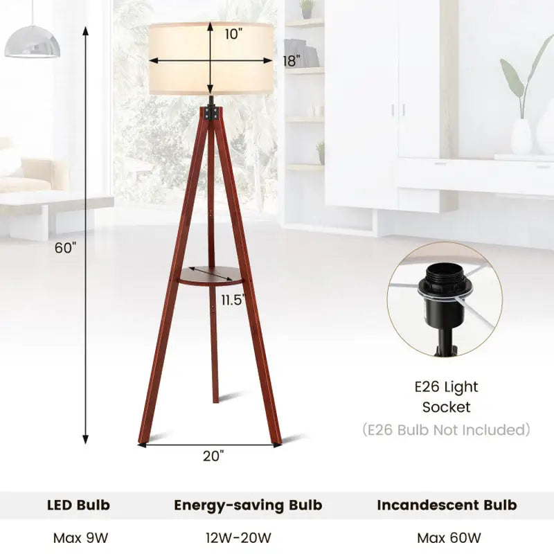 Wooden tripod floor lamp with cream drum shade and built-in circular shelf