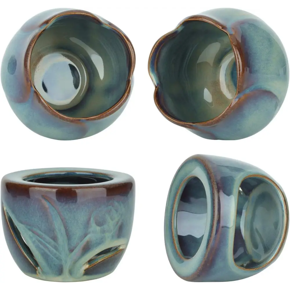 Ceramic oil burner with turquoise glaze and leaf patterns, ideal for ceramic wax use