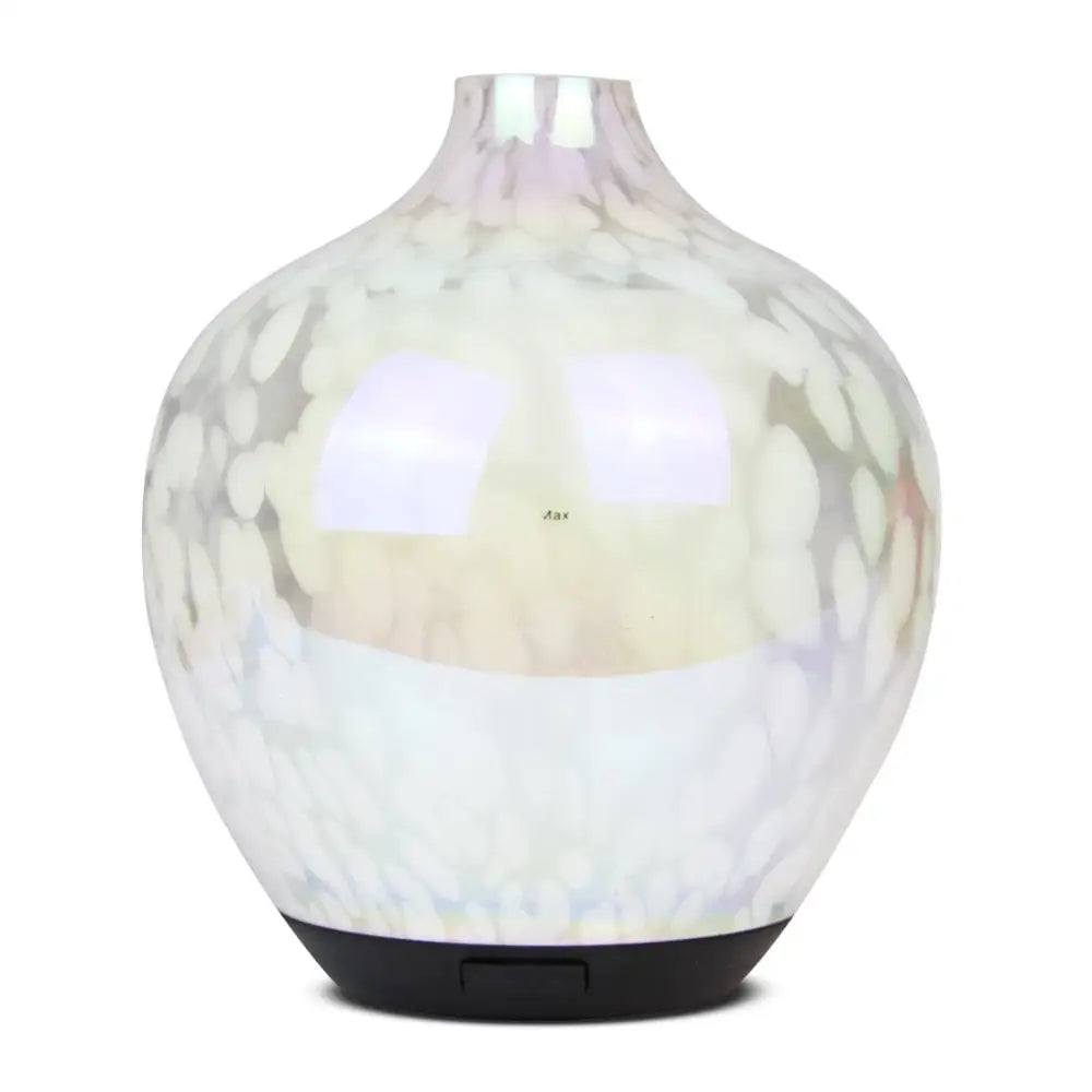 Pearl-colored glass diffuser with black base for a designer glass aroma experience